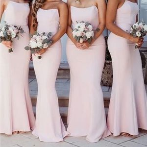 Pink strapless mermaid style bridesmaids dress